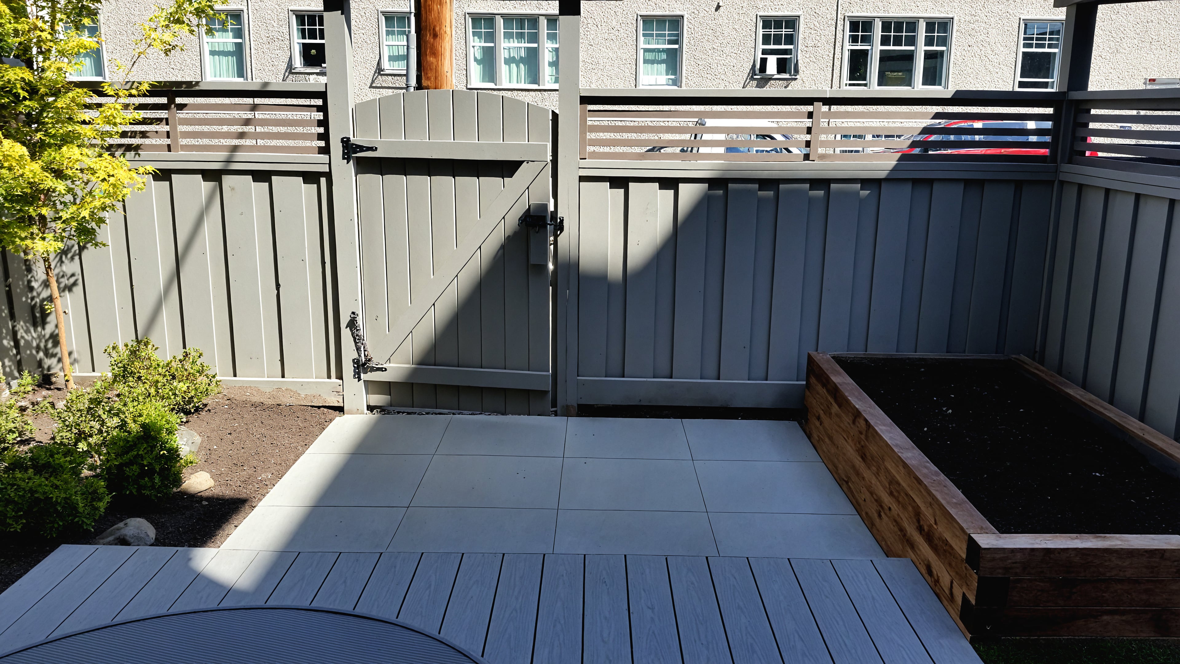 Composite decking, Garden boxes, Artificial turf and Concrete slabs at the Alder St project.