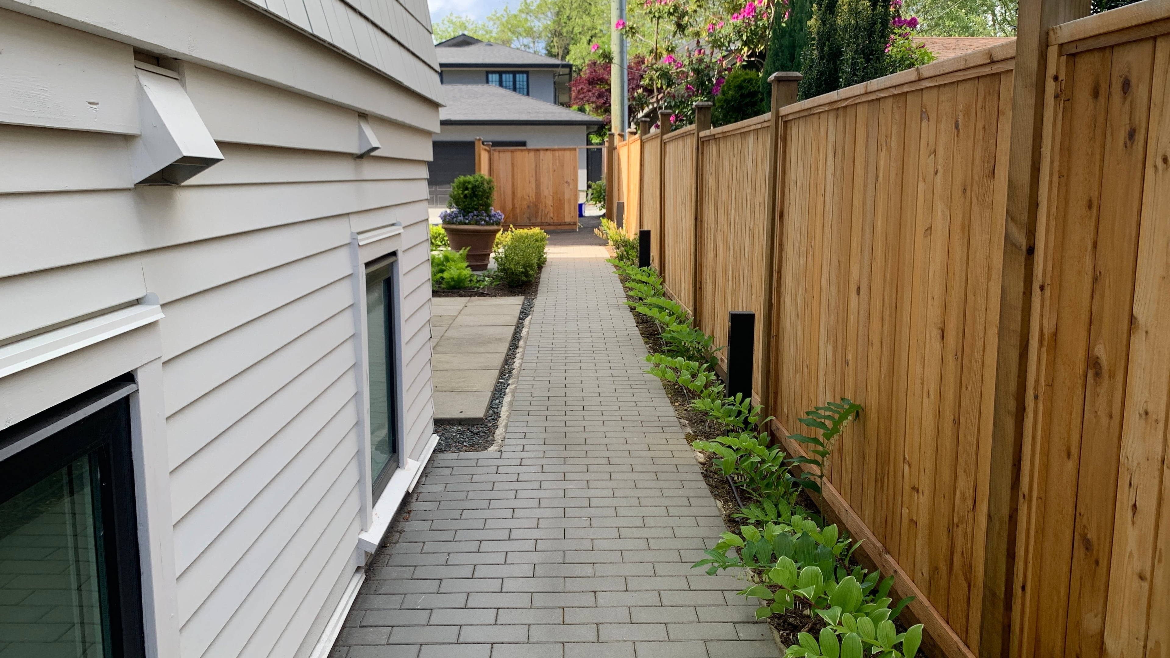Irrigation, Sod lawn, Plants and Interlocking pavers at the Larch St project.