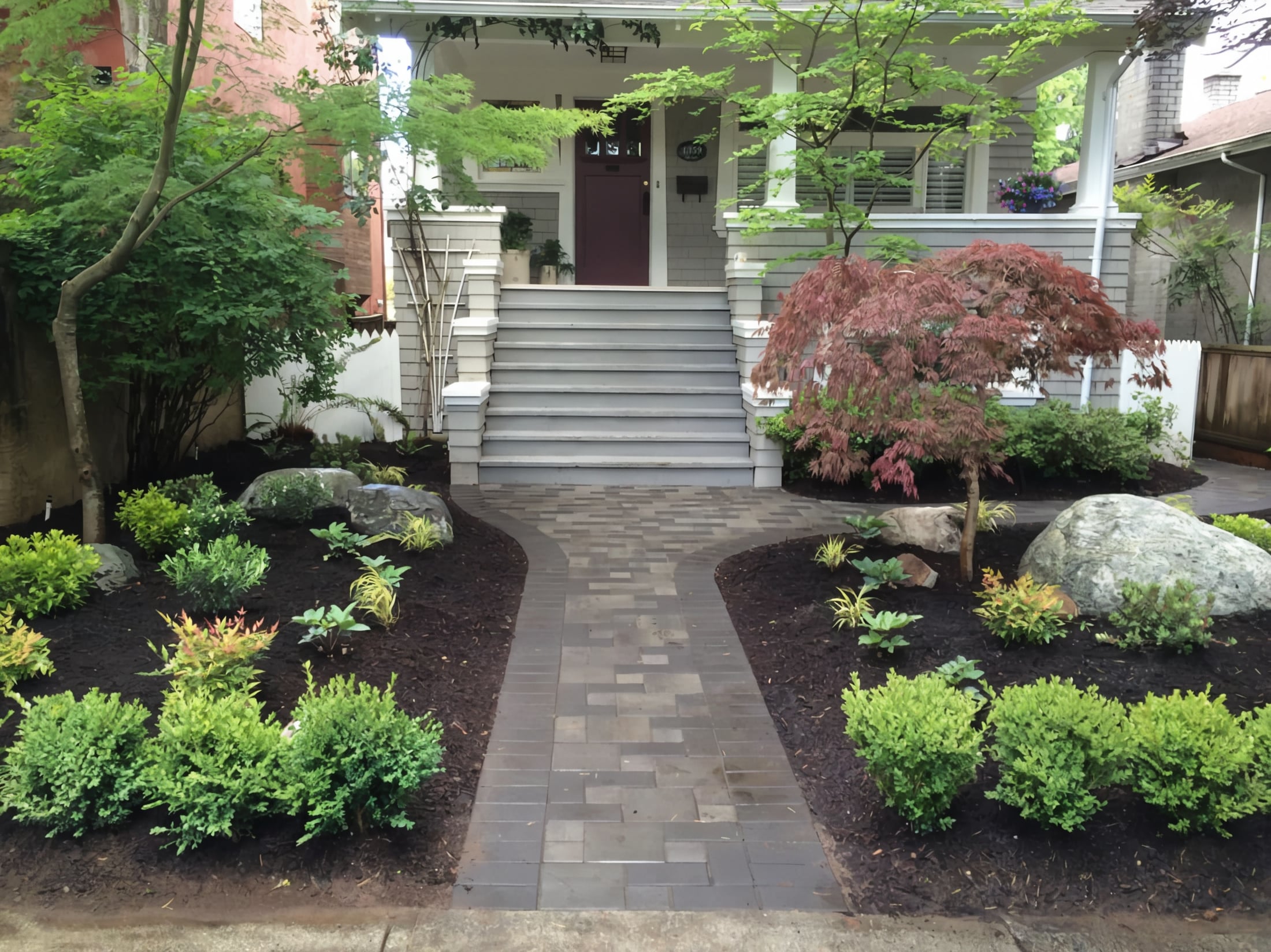 Interlocking pavers, Micro clover, Garden beds and Plants at the West 11th project.