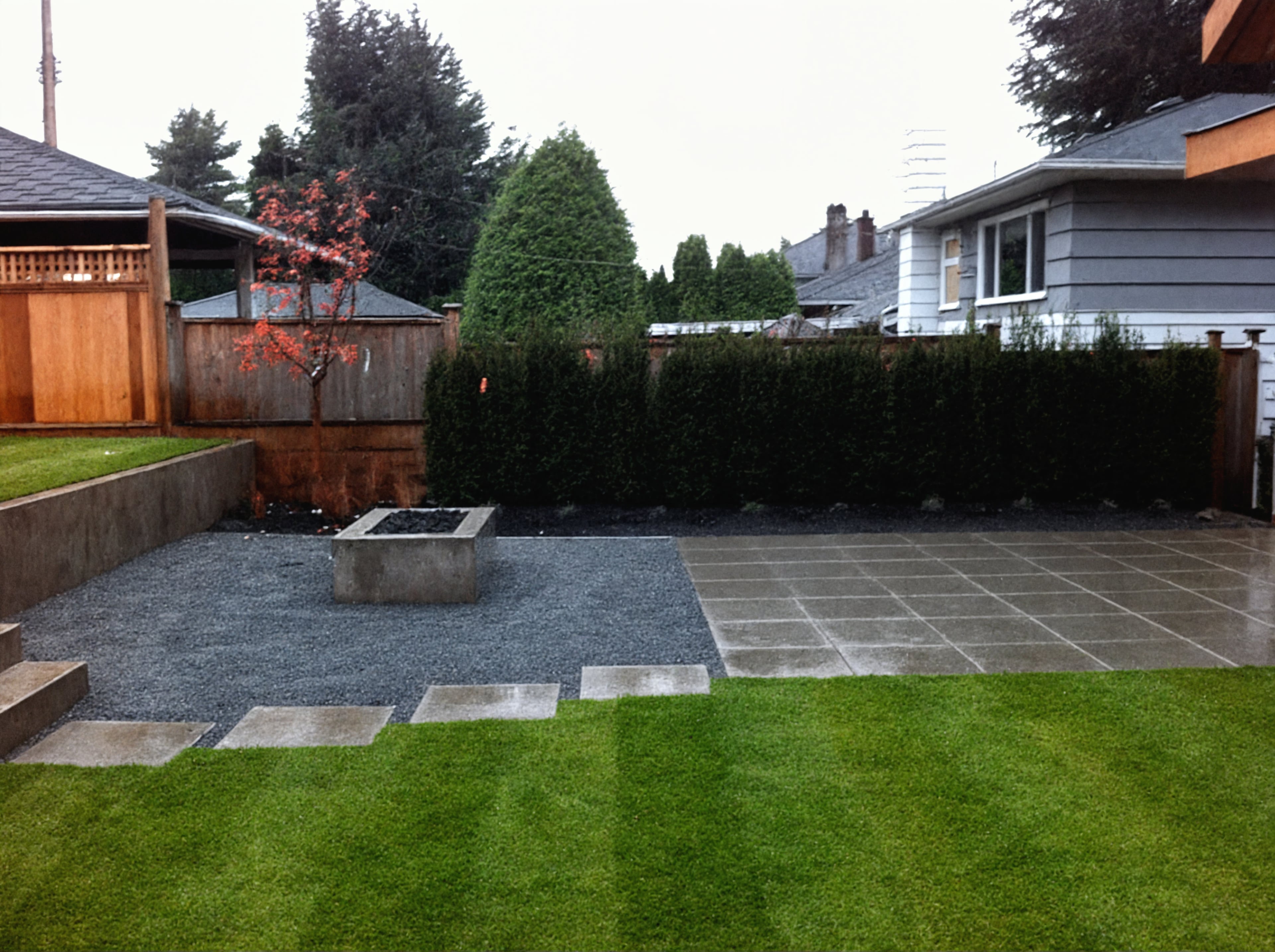 Sod lawn, Concrete slabs, Hedges and Plants at the West 32nd project.