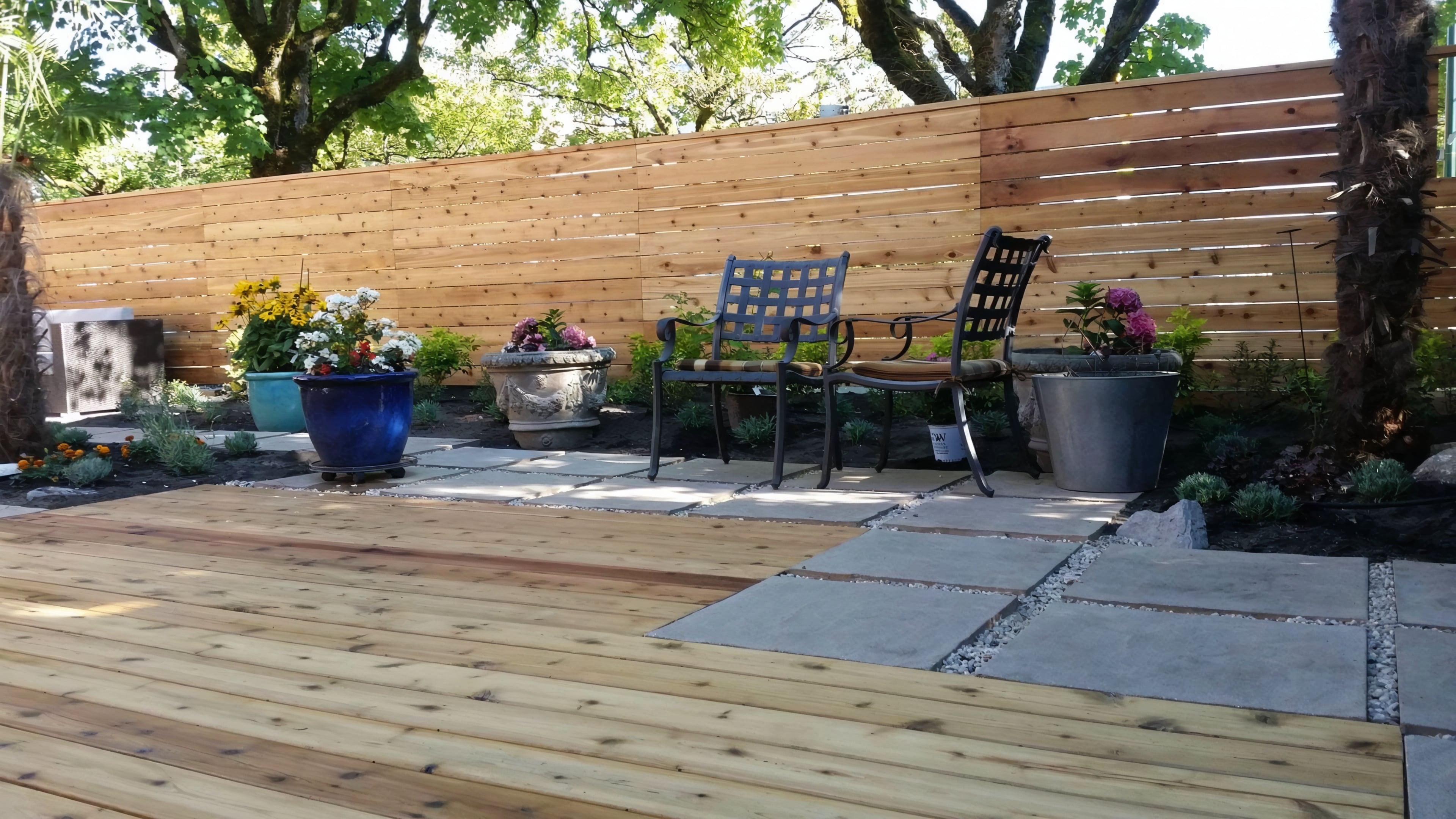 Cedar fencing, Cedar patio, Concrete slabs and Trees at the West 6th project.